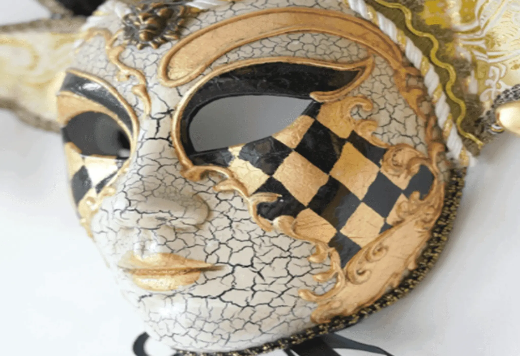 Ornate gold and black Venetian carnival face mask